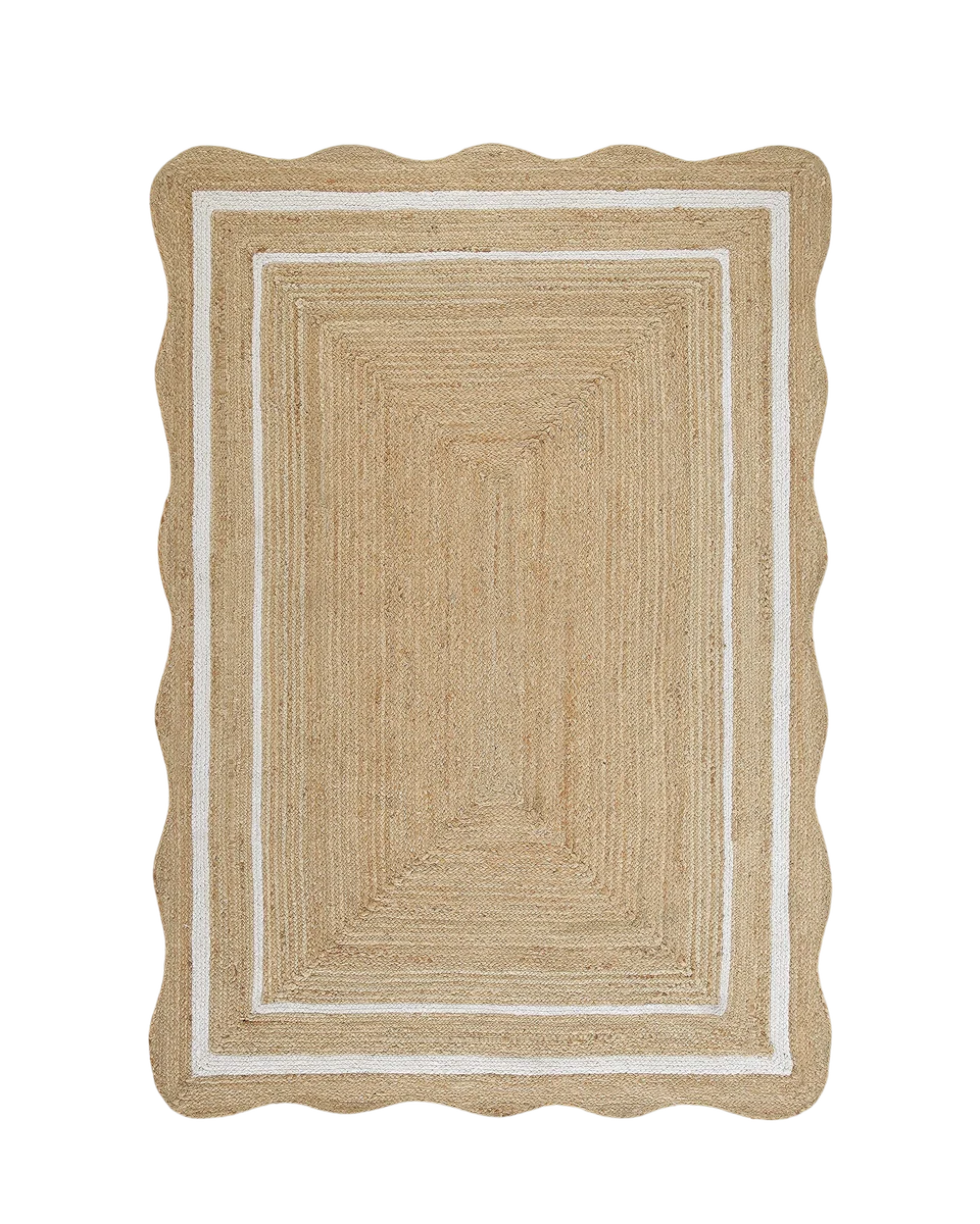hand-braided scalloped jute rug in natural by Daals