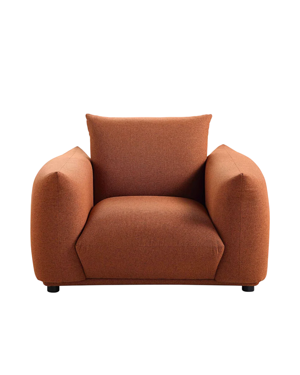 curved low upholstered armchair