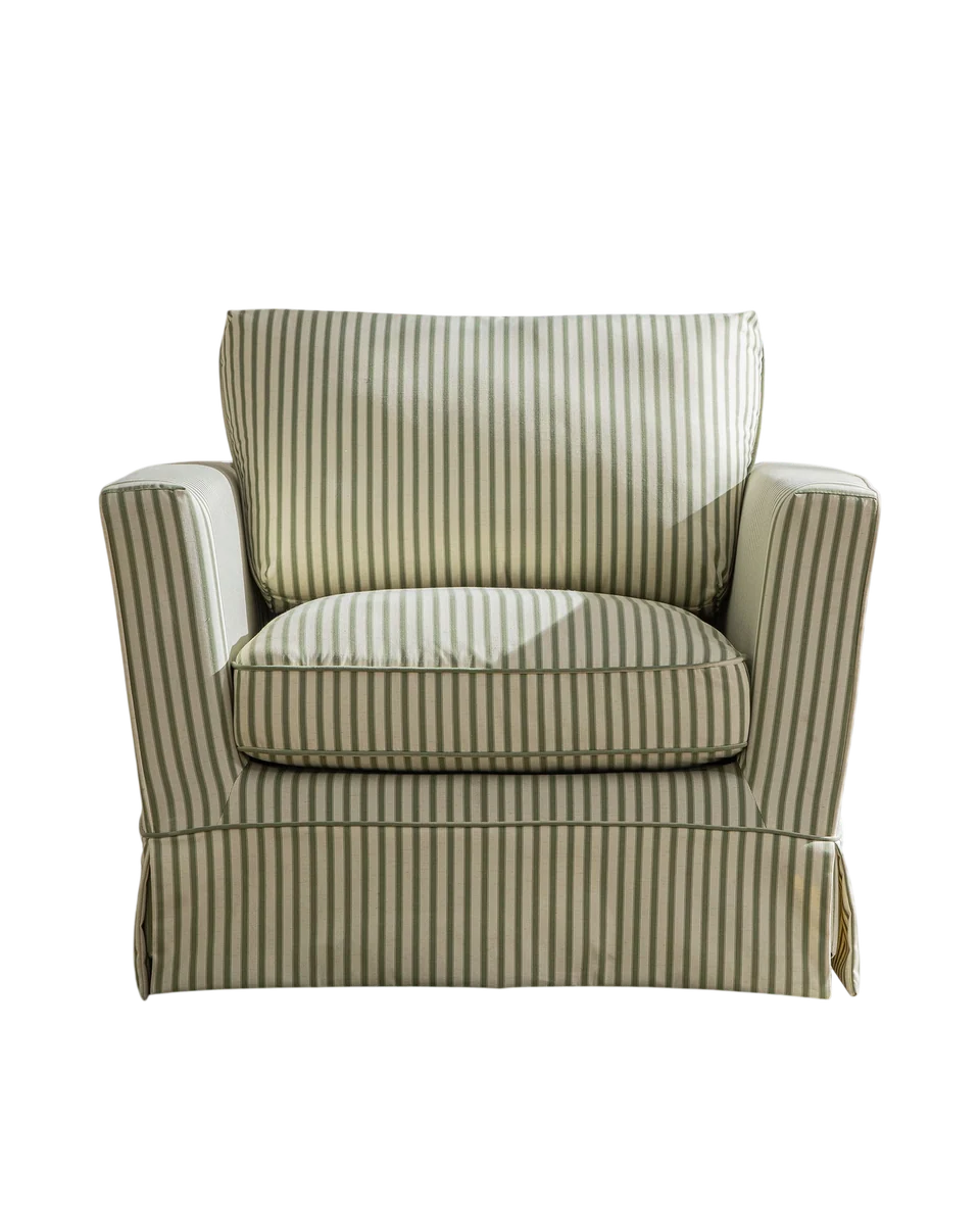 skirted loose cover armchair in sage by Daals