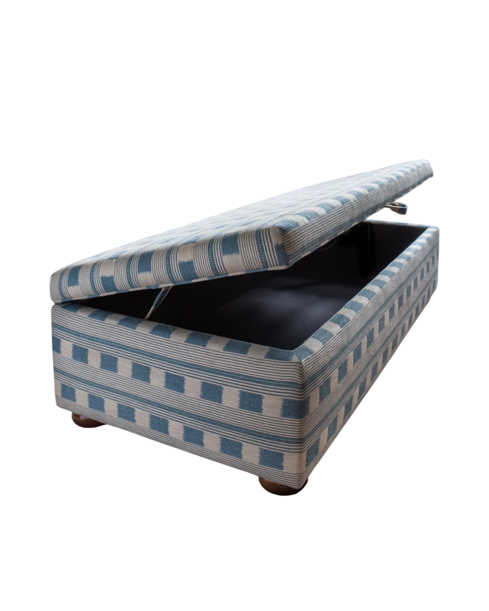 handmade upholstered storage ottoman in blue by The House Upstairs