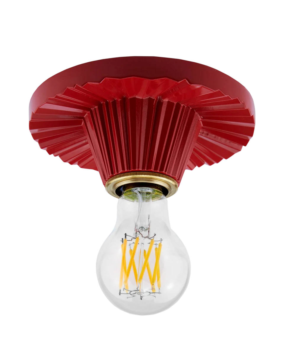 red cast aluminium ceiling light in poppy by Beata Heuman
